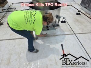 Amber installing grease curb to prevent roof damage